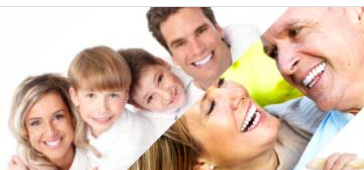 Smiling multigenerational family—grandparents, parents and children—close-up against a bright white background