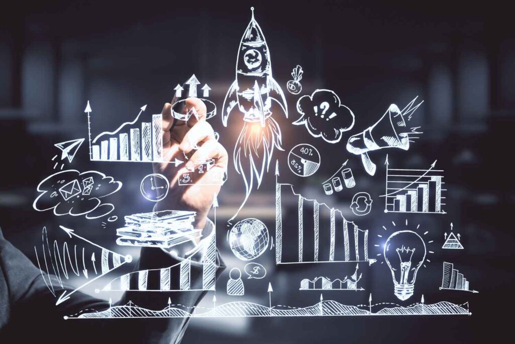 Hand drawing white sketch of a rocket, bar charts, lightbulb and other business growth icons on a dark transparent screen.