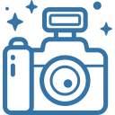 Blue outline camera icon with central lens and viewfinder, surrounded by small sparkles