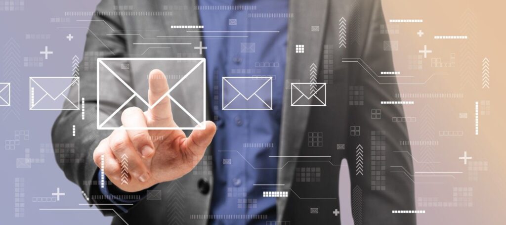 Person in a suit touching a translucent email envelope icon on a floating digital interface.