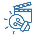 Clapperboard beside a glowing lightbulb icon, symbolising a video idea or creative concept